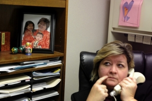 Carla makes phone calls from her office in the Hardin County Department of Education where she works in the human resources department.  Carla has worked in education her entire professional career due to her love of children.