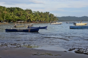 Anchored fishing boats sits anchored off the coast of Puerto Viejo in Costa Rica's Southern Caribbean. Like the other communities in the area, most of the town's residents rely on fishing and tourism to make a living.