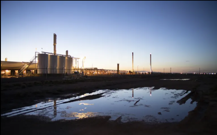 An oil processing facillity flares excess natural gas south of Carlsbad.